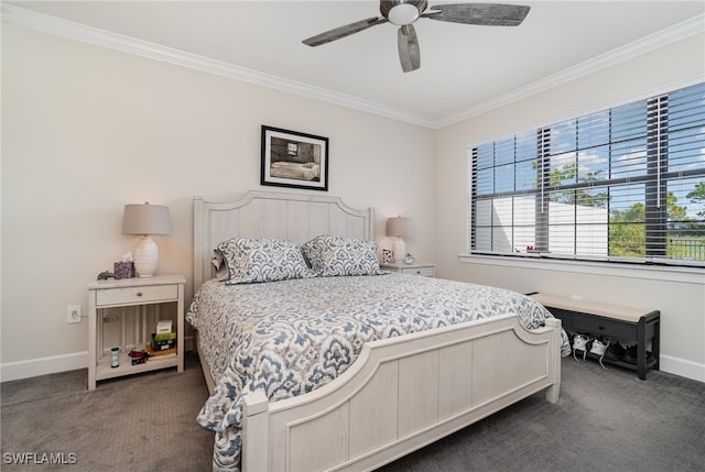 carpeted bedroom featuring ceiling fan and crown molding