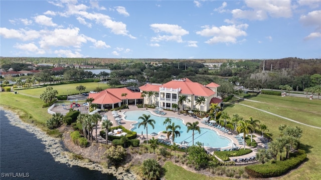 birds eye view of property with a water view