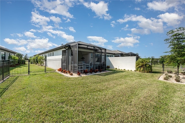 view of yard with a sunroom