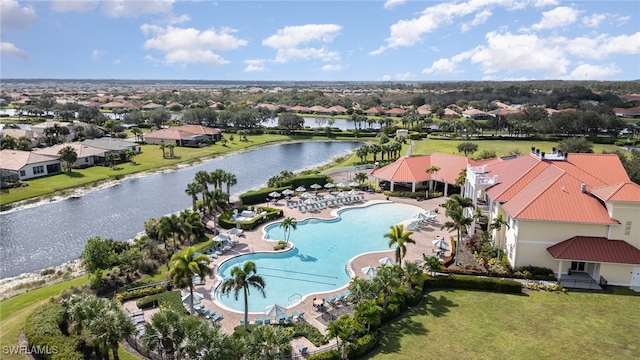 drone / aerial view with a water view