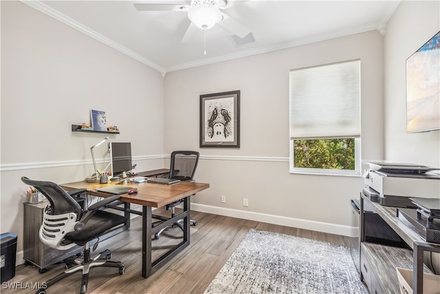 office space featuring ceiling fan, crown molding, and light hardwood / wood-style flooring