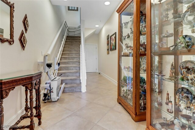 foyer with light tile patterned floors