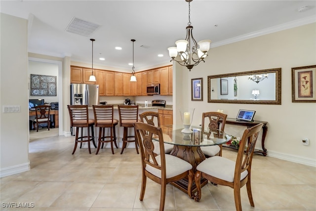 dining room with an inviting chandelier, ornamental molding, and light tile patterned floors