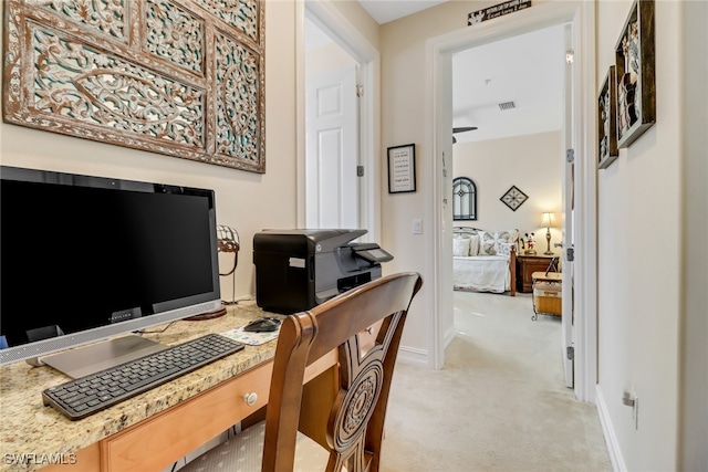 office area with light colored carpet