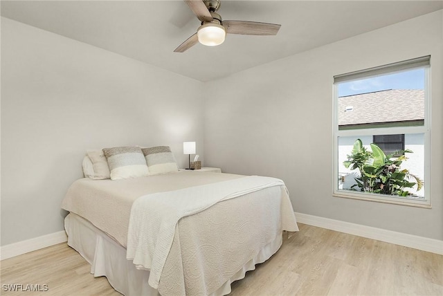 bedroom featuring ceiling fan and light wood-type flooring