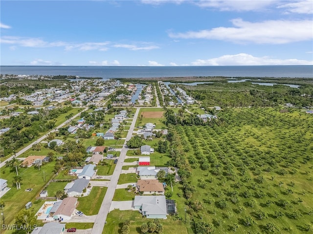 drone / aerial view featuring a water view