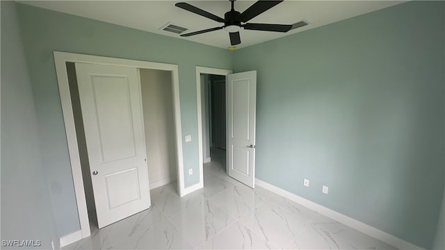 unfurnished bedroom featuring ceiling fan