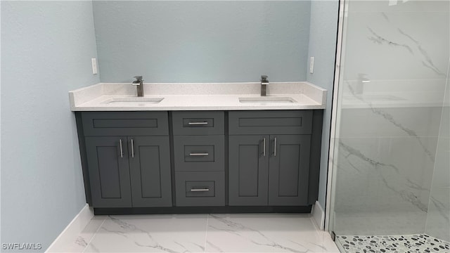 bathroom with vanity and a tile shower