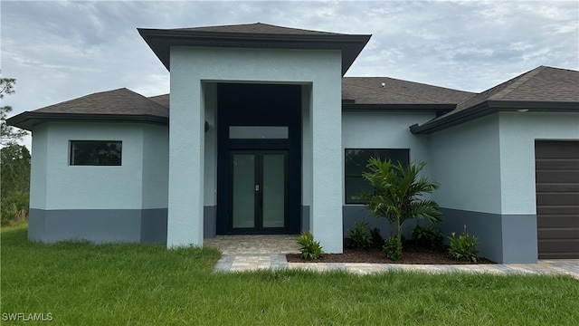 doorway to property featuring a garage