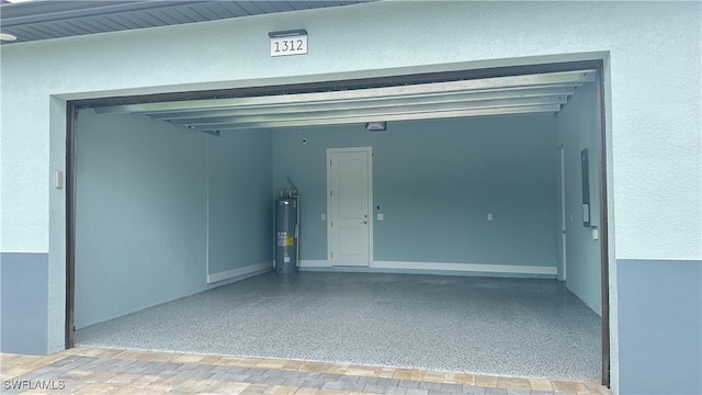 garage featuring electric water heater