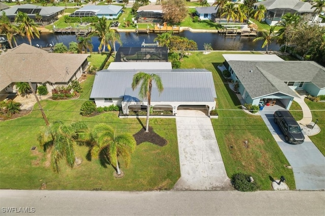 drone / aerial view featuring a water view