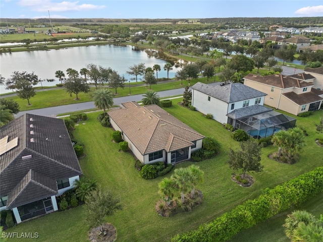 bird's eye view with a water view