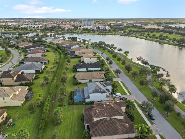 bird's eye view with a water view