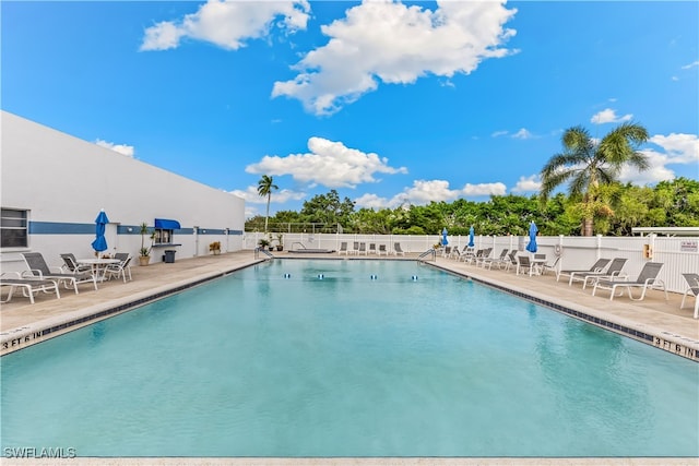 view of swimming pool featuring a patio area