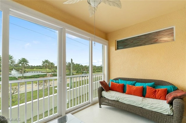 sunroom with a water view