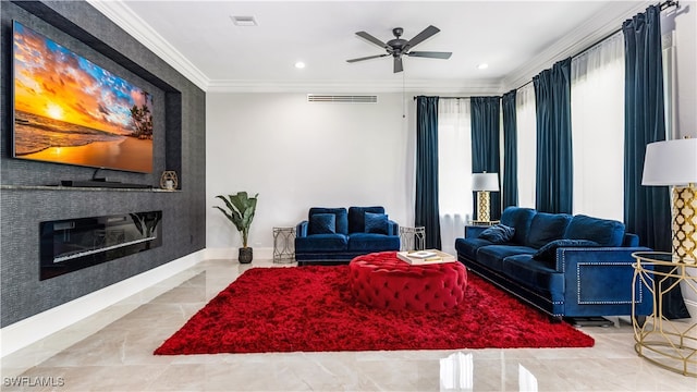 living room with crown molding, a large fireplace, and ceiling fan