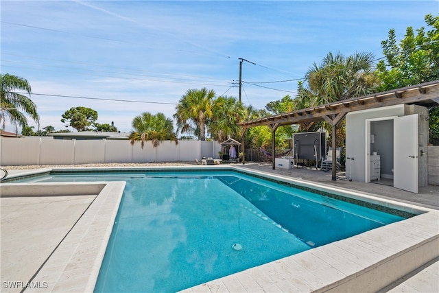 view of pool featuring a patio