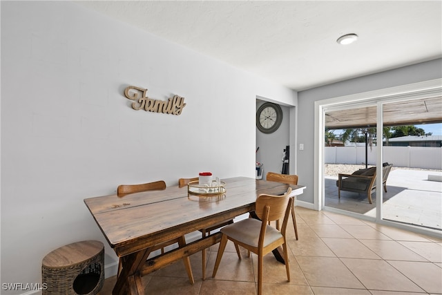 view of tiled dining space