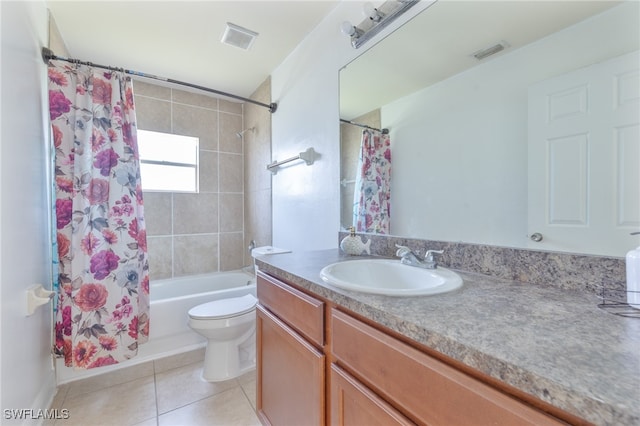 full bathroom with vanity, toilet, tile patterned floors, and shower / bath combination with curtain