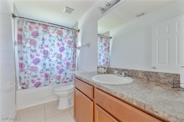 full bathroom with vanity, toilet, tile patterned floors, and shower / bathtub combination with curtain