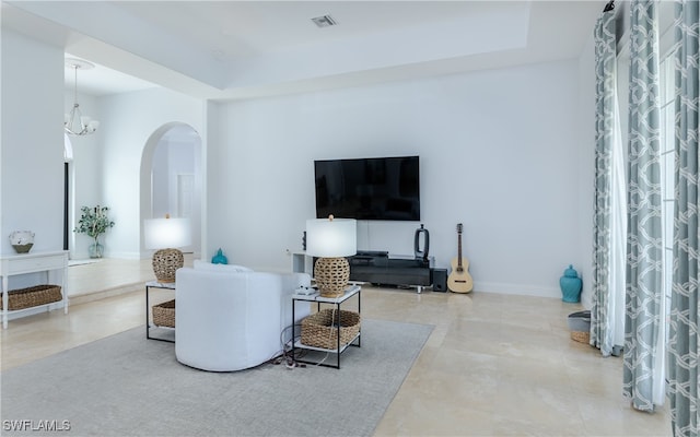 living room with a chandelier