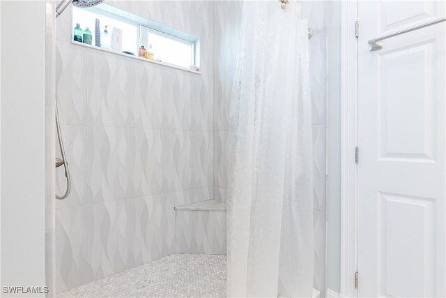 bathroom with curtained shower