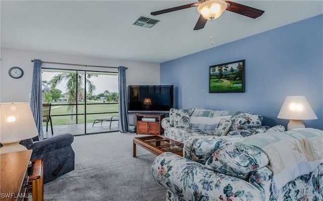 living room with light carpet and ceiling fan