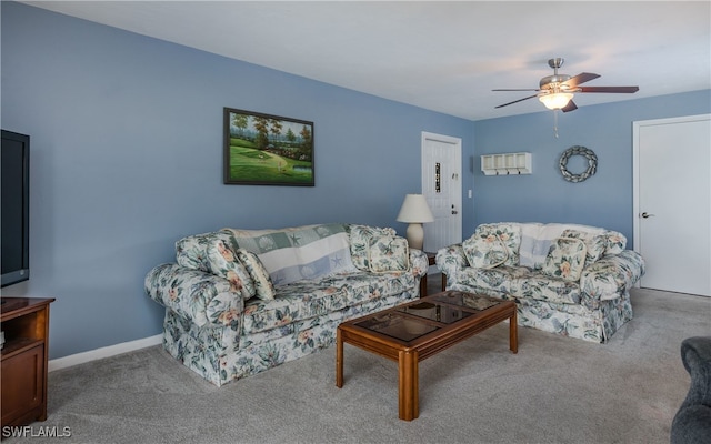 living room featuring ceiling fan and light colored carpet