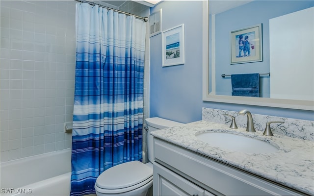 full bathroom featuring toilet, shower / bath combo, and vanity