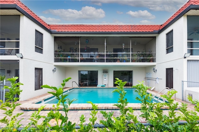 view of swimming pool featuring a patio