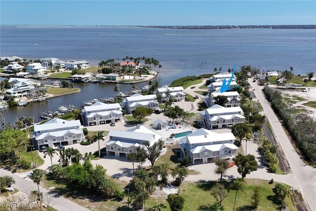 drone / aerial view with a water view