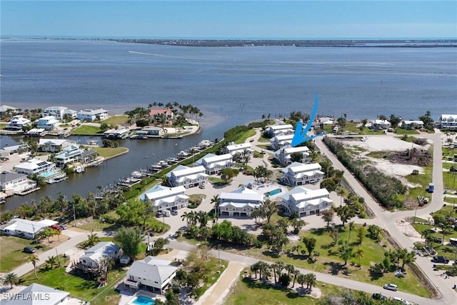 birds eye view of property featuring a water view