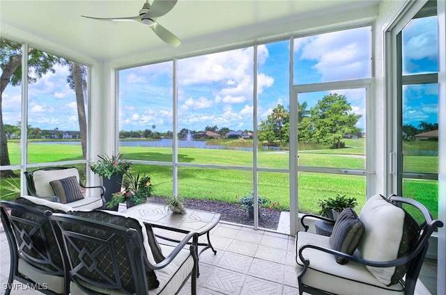 sunroom with ceiling fan and a healthy amount of sunlight