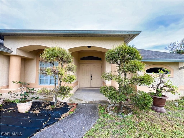 4895 Golfview Blvd, Lehigh Acres, FL 33973 - entrance to property with stucco siding
