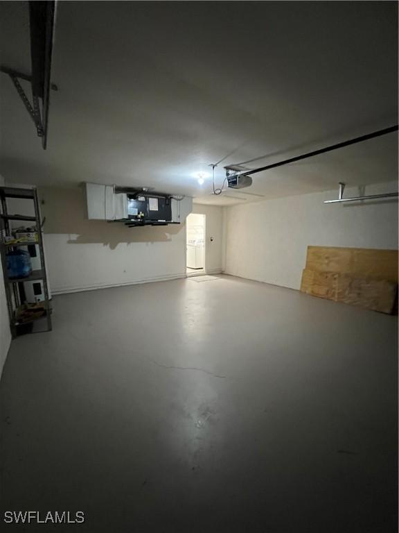 4895 Golfview Blvd, Lehigh Acres, FL 33973 - garage with a garage door opener
