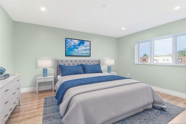 bedroom featuring light hardwood / wood-style floors