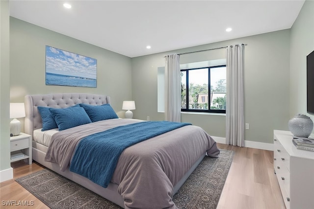 bedroom featuring light hardwood / wood-style floors