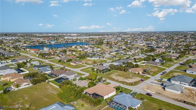 1200 SW 38th St, Cape Coral, FL 33914 - aerial overview of property's location with nearby suburban area and a nearby body of water