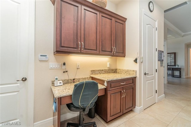 1200 SW 38th St, Cape Coral, FL 33914 - office area with built in study area, light tile patterned flooring, and baseboards