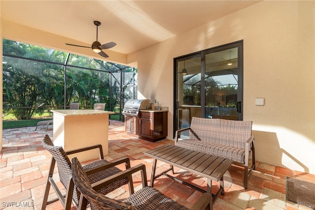 view of patio / terrace with ceiling fan, a lanai, area for grilling, a grill, and outdoor dining space