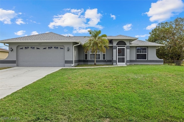 single story home featuring a front yard and a garage