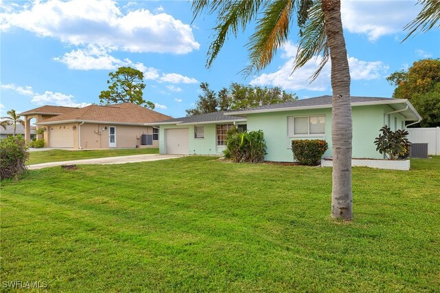 single story home with central air condition unit, a garage, and a front lawn