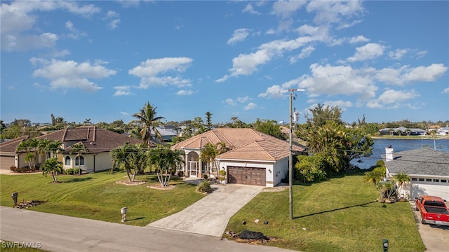 view of front facade with a front lawn and a garage