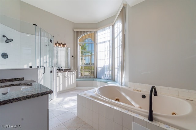 bathroom with vanity, separate shower and tub, and tile patterned flooring