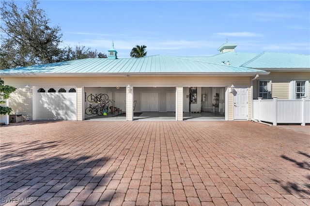 view of front of property featuring a garage