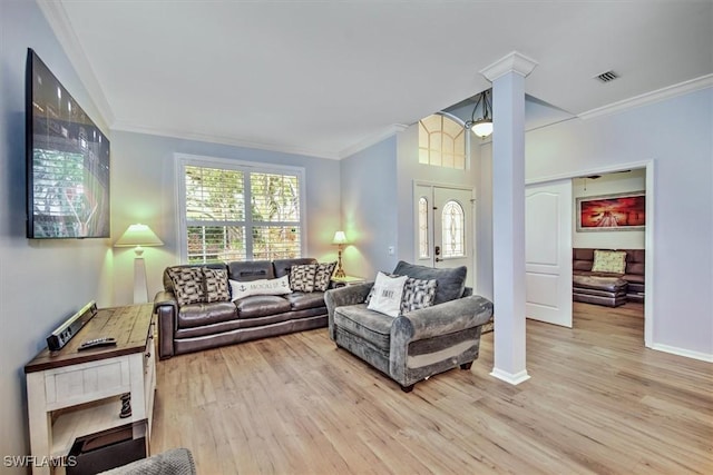 15600 Willow Oak Ct, Fort Myers, FL 33912 - living room with crown molding, light wood-style flooring, and baseboards