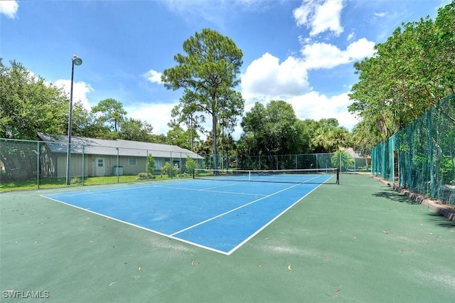 15600 Willow Oak Ct, Fort Myers, FL 33912 - view of tennis court featuring fence