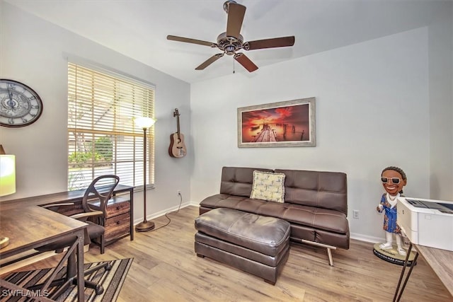 15600 Willow Oak Ct, Fort Myers, FL 33912 - living area featuring a desk, wood finished floors, a ceiling fan, and baseboards