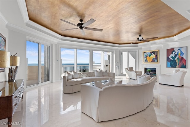 living room with a water view, a raised ceiling, ceiling fan, and wooden ceiling