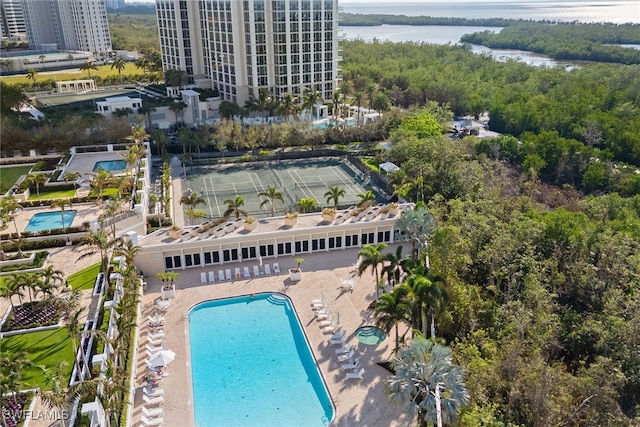 birds eye view of property with a water view